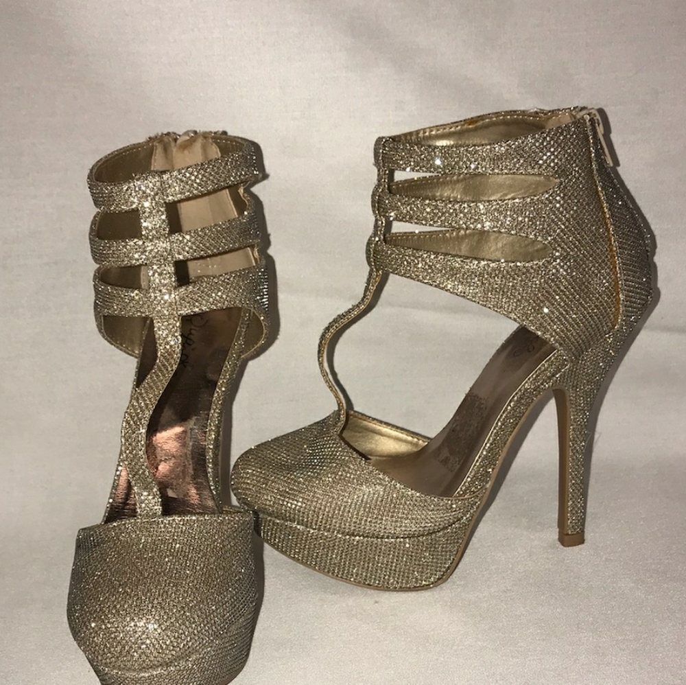 Sparkly gold high heels
